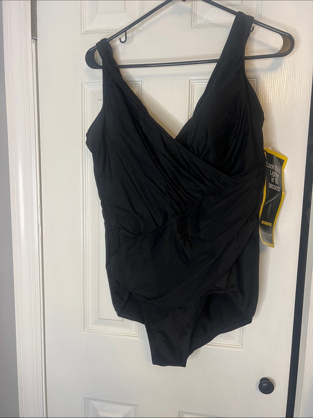 Miraclesuit Black One-Piece Swimsuit 

NWT size 20w